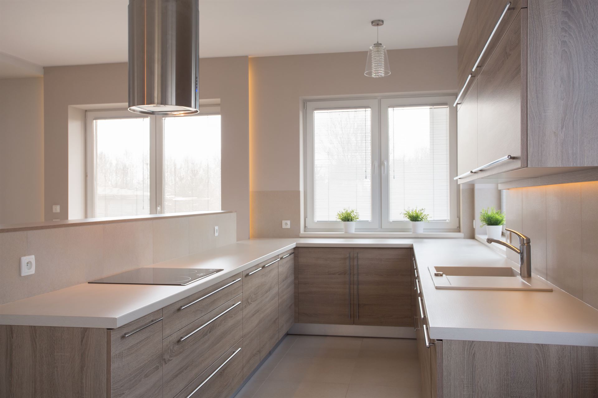 Picture of new style commodious kitchen in light colors